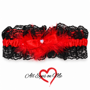 Black lace garter with red gathered band, red feather trim, satin bow and heart detail, front view