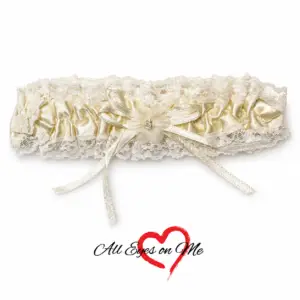 Ivory satin garter with cream lace, flower and ribbon bow, front view
