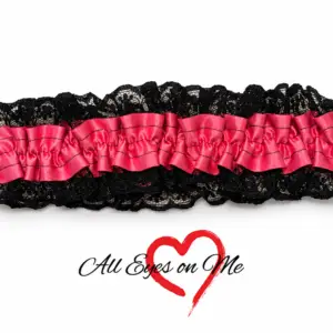 Hot pink gathered satin garter with black lace trim, front view