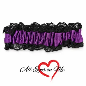 Purple gathered garter with black lace trim, front view