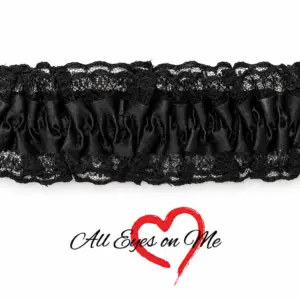 Black gathered garter with black floral lace trim, front view