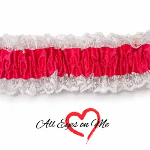 Hot pink gathered garter with white lace trim, front view
