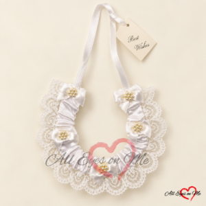 White satin and lace bridal horseshoe with five pearl-look bows, shown from the front