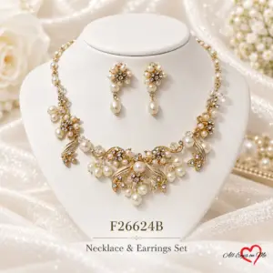 Gold-tone floral bridal necklace arranged around matching pearl-style drop earrings.