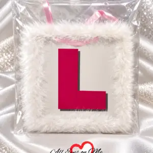 White Bride To Be L Plate with fluffy white tinsel trim and pink ribbon ties