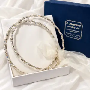 Pair of 69 g 925 sterling silver Greek Orthodox Stefana with clear crystal accents — front view