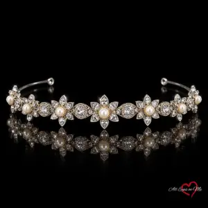 Silver-tone floral pearl-style bridal tiara T-8595 on a black background